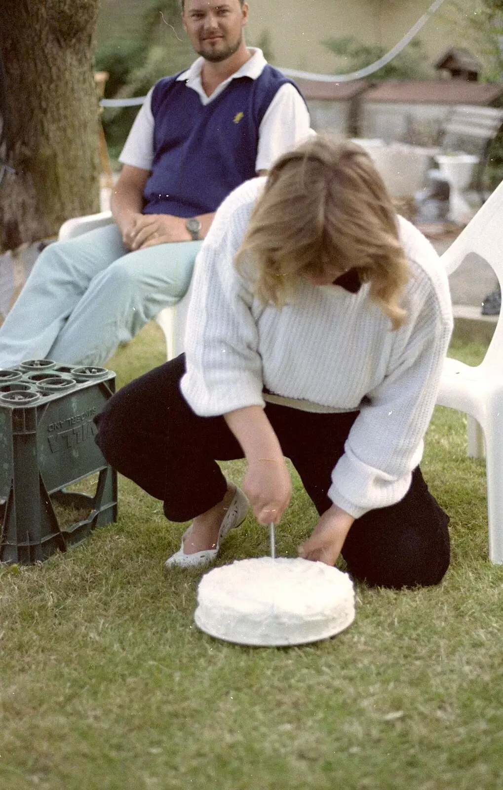 Sarah chops up her birthday cake, from Sarah's Birthday Barbeque, Burston, Norfolk - 7th June 1994