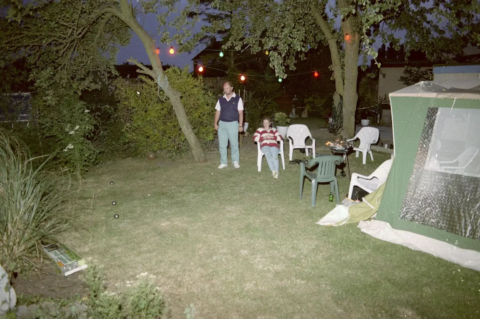 There's a game of boules in the garden, from Sarah's Birthday Barbeque, Burston, Norfolk - 7th June 1994