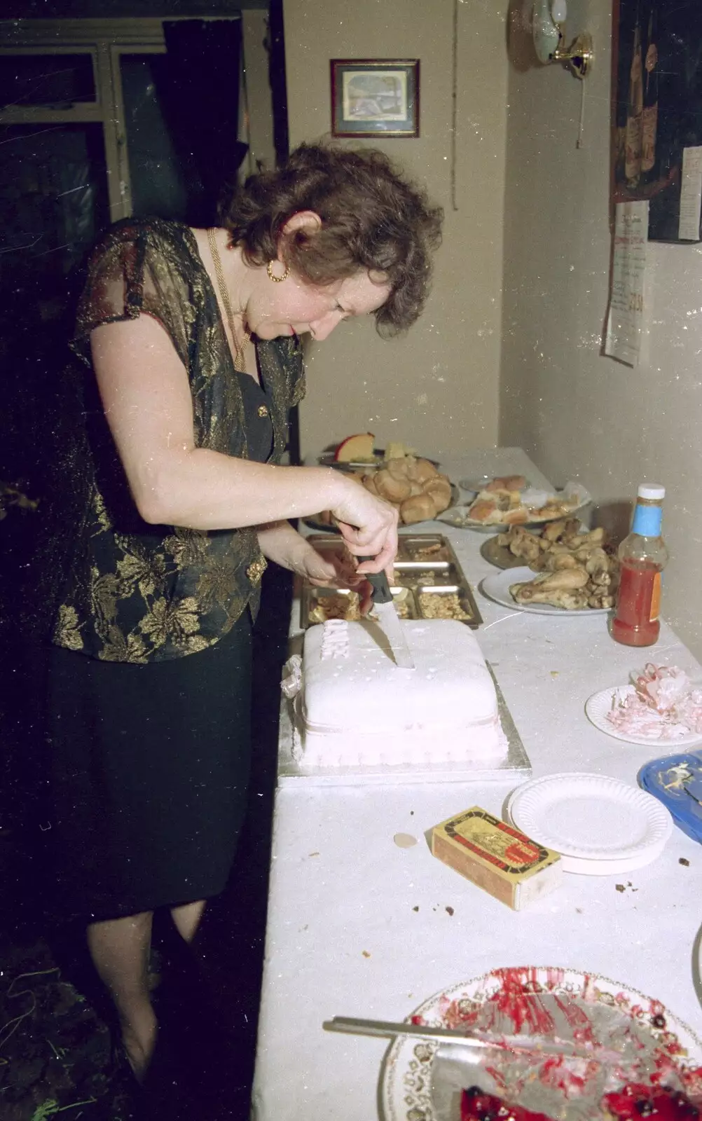 Sylvia cuts the cake, from Claire's Eighteenth Birthday, The Swan Inn, Brome, Suffolk - 11th June 1994