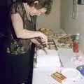 Sylvia cuts the cake, Claire's Eighteenth Birthday, The Swan Inn, Brome, Suffolk - 11th June 1994