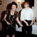 Sylvia and Rainey play with silly-string