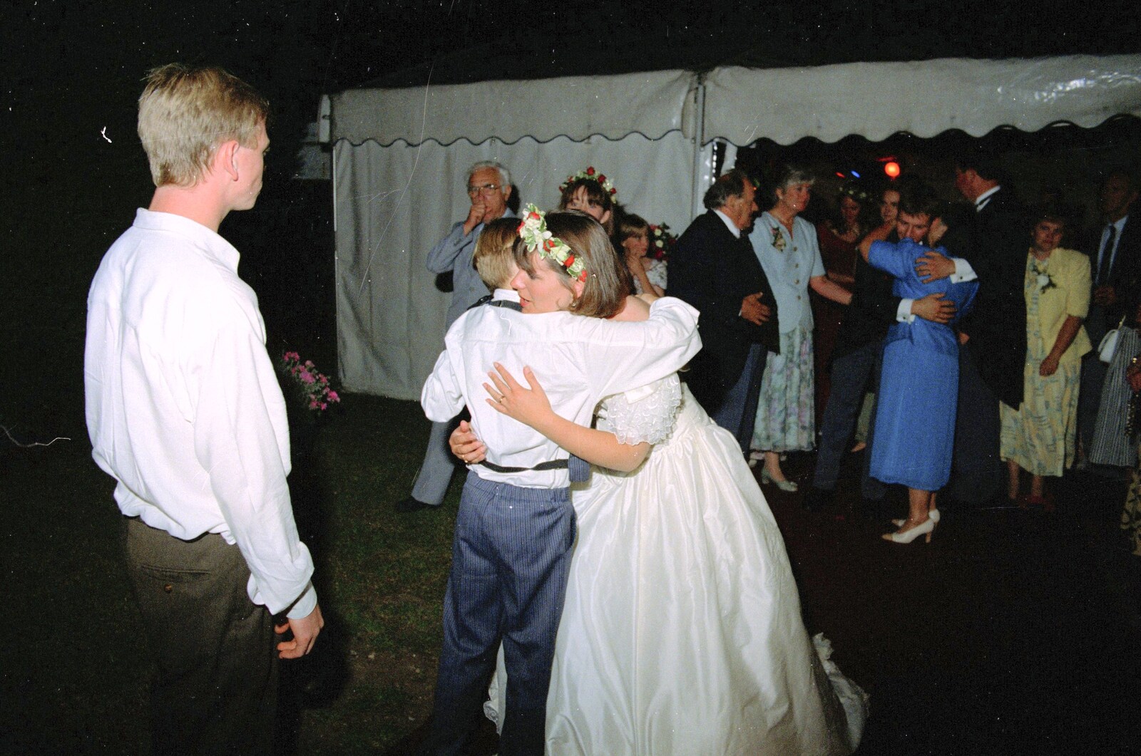 A page boy gets a hug from Bernie's Anniversary and Charlie's Wedding, Palgrave and Oakley, Suffolk - 19th July 1994