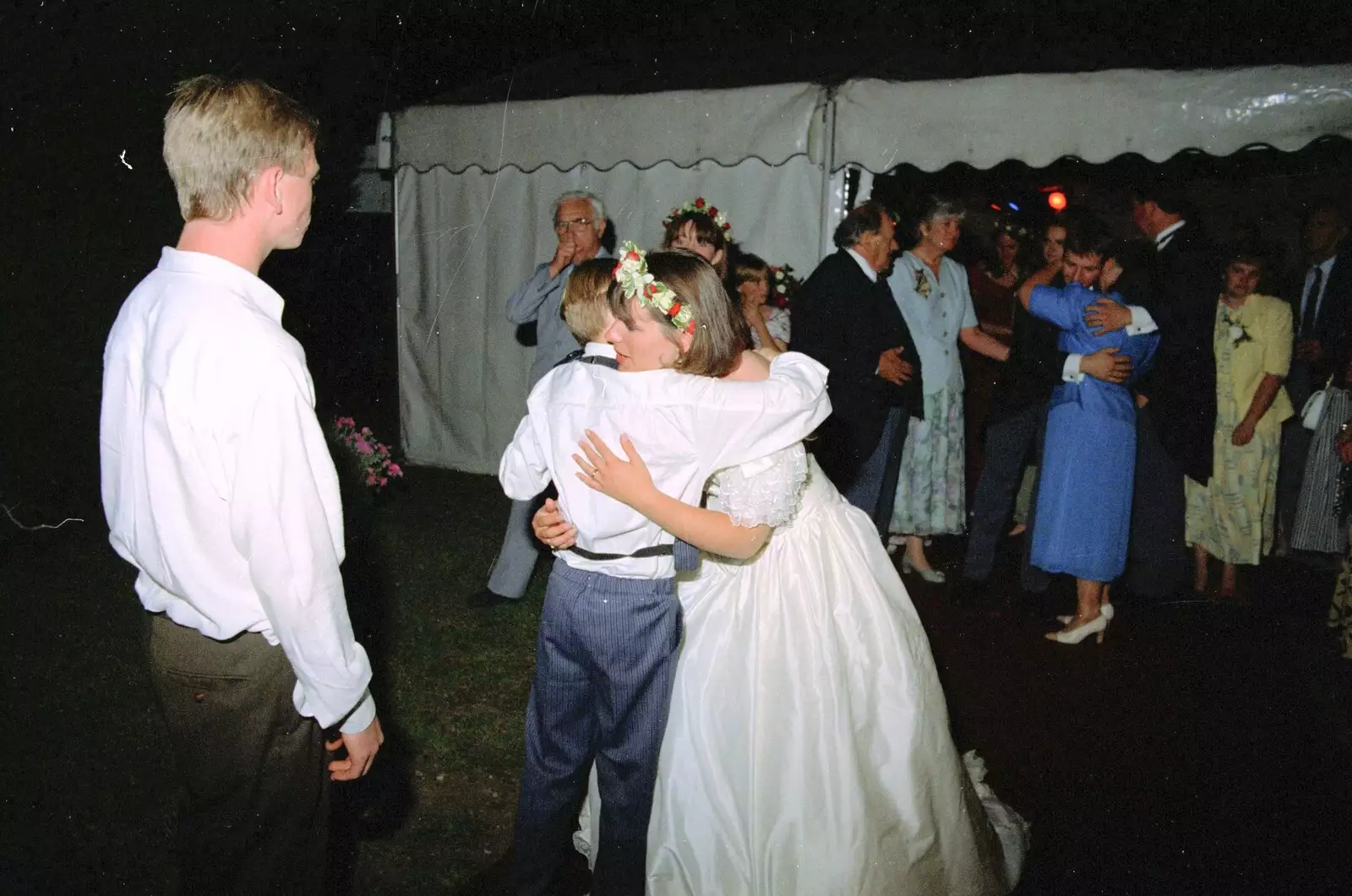 A page boy gets a hug, from Bernie's Anniversary and Charlie's Wedding, Palgrave and Oakley, Suffolk - 19th July 1994