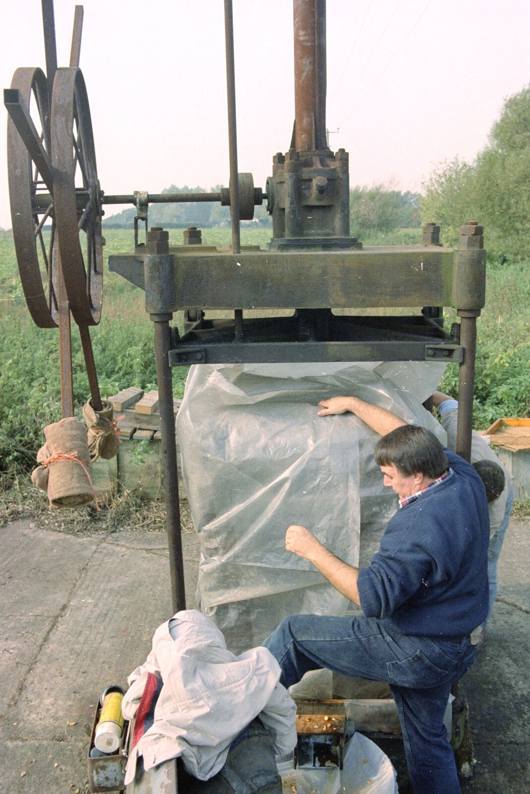 Cider Making (without Rosie), Stuston, Suffolk - 23rd September 1994: The cheeses are wrapped with plastic to keep the juice in
