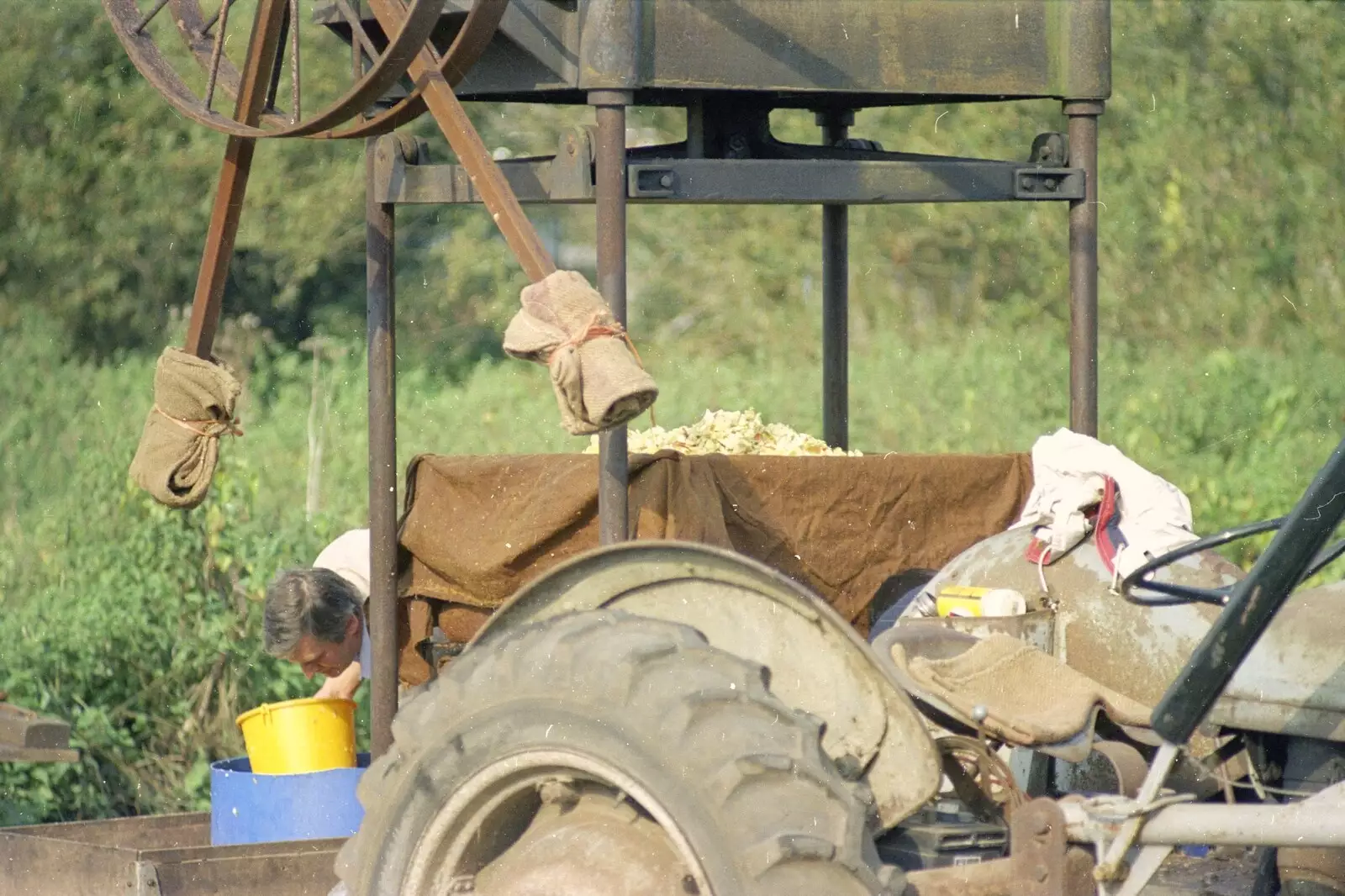 Winnie the tractor and the former rag press, from Cider Making (without Rosie), Stuston, Suffolk - 23rd September 1994