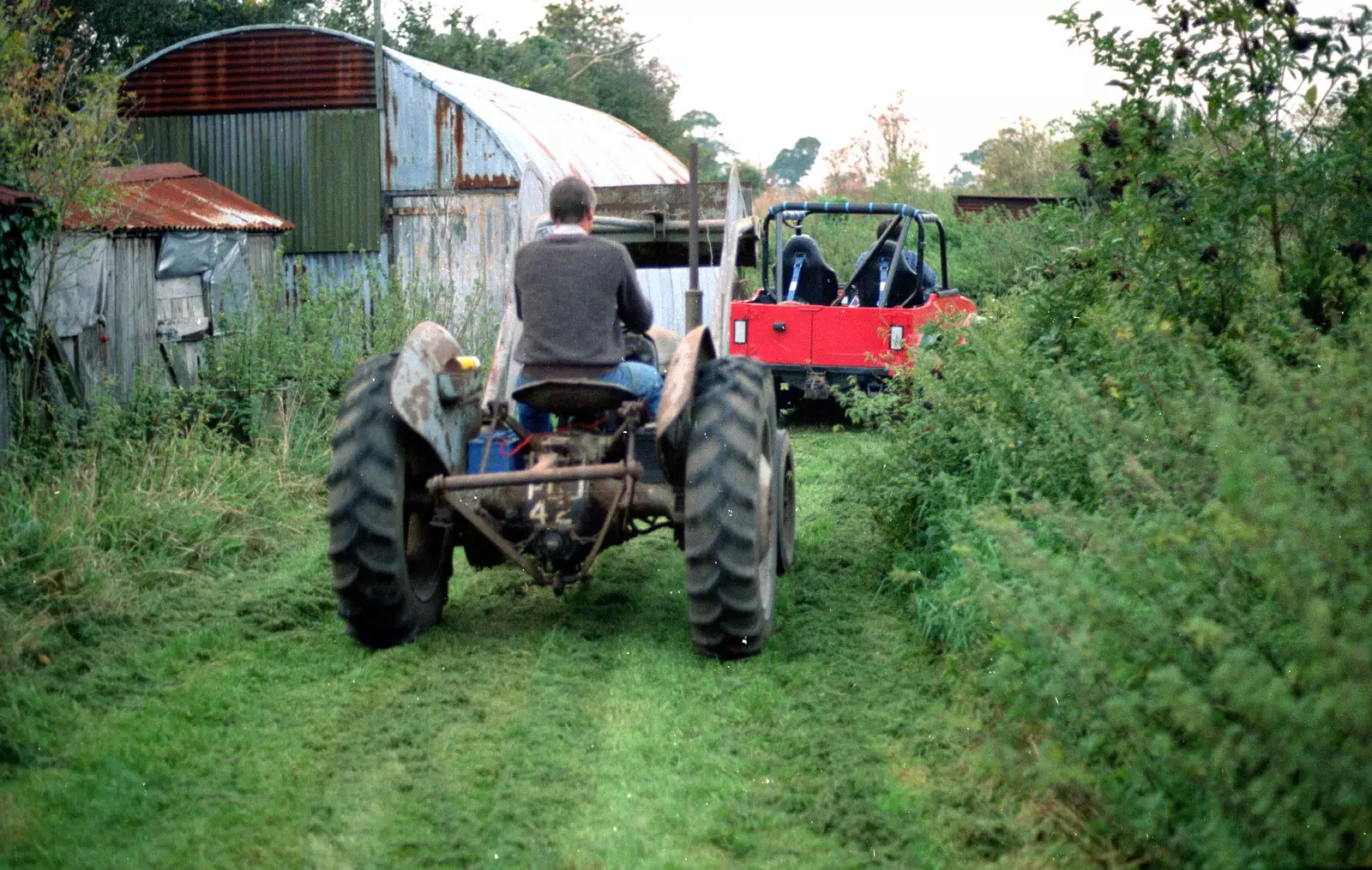 Geoff trundles behind in Winnie the grey Fergie tractor, from Off-Roading With Geoff and Brenda, Suffolk - 10th October 1994