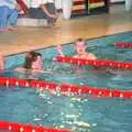 Wavy and Bill pause at the end of a length, The Swan does the BHF Sponsored Swim, Diss Pool, Norfolk - 3rd October 1994