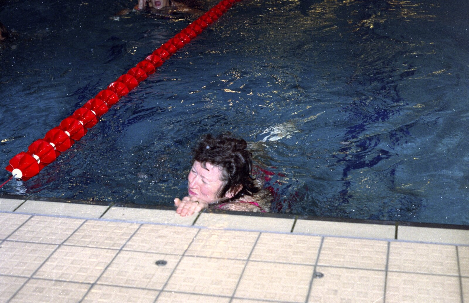 Sylvia finishes another lap from The Swan does the BHF Sponsored Swim, Diss Pool, Norfolk - 3rd October 1994