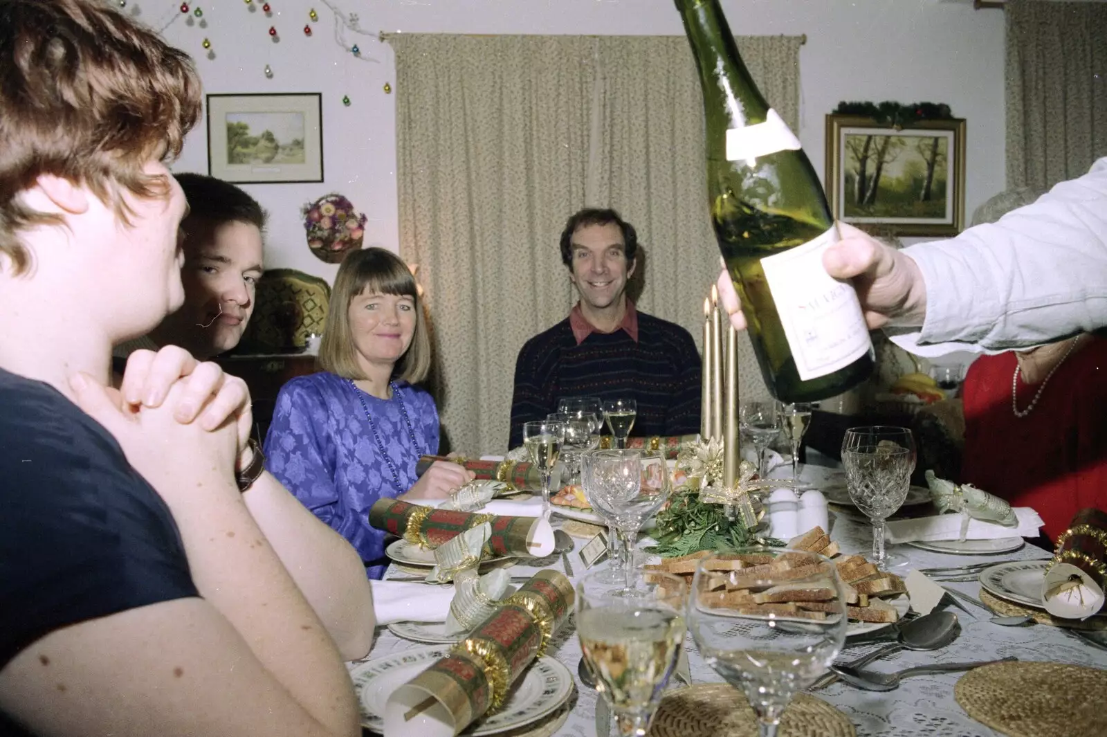 Neil pours out a spot of Sauvignon, from Christmas Down South, Burton and Walkford, Dorset - 25th December 1994