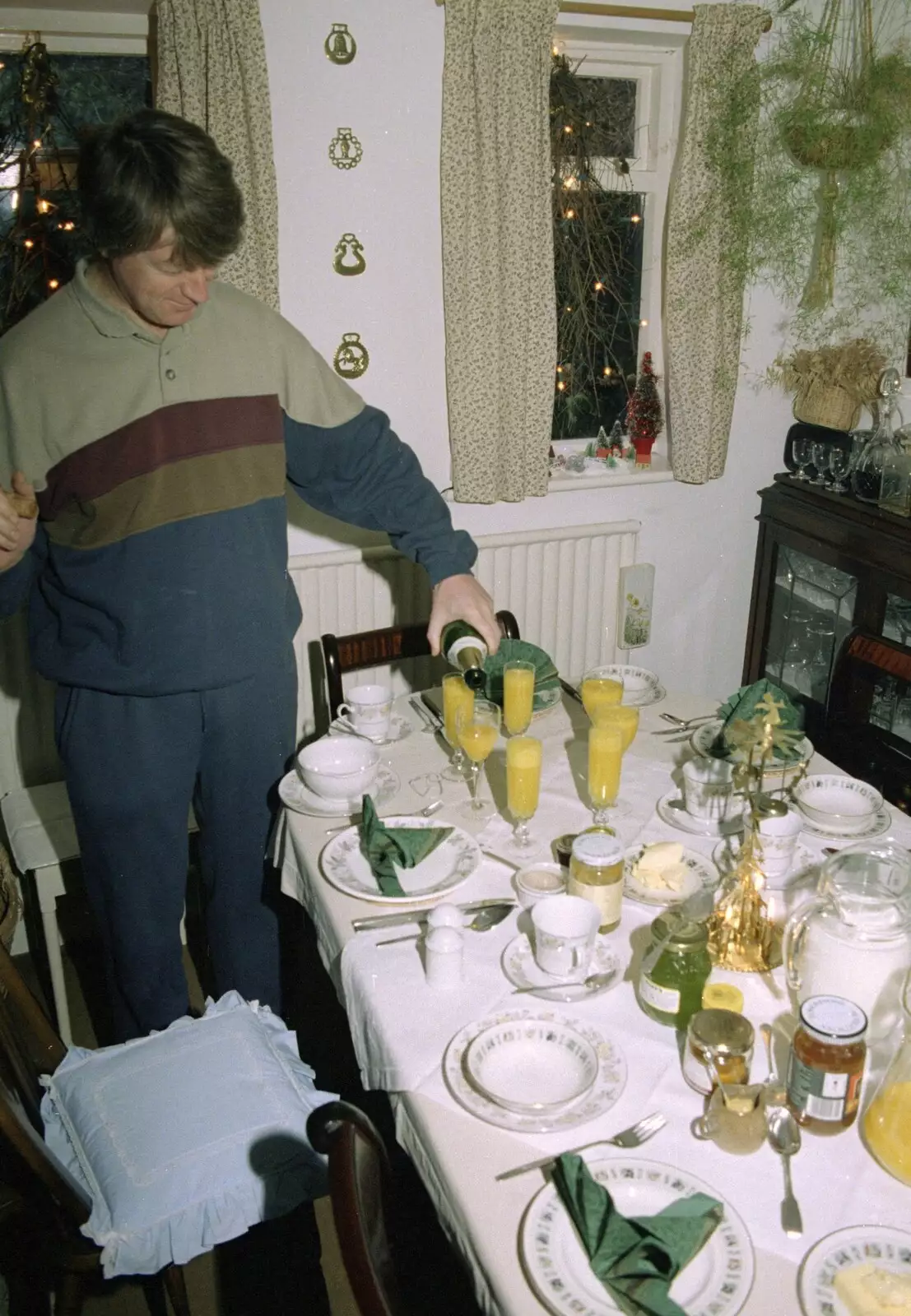 Neil pours some Bucks Fizz on Boxing Day, from Christmas Down South, Burton and Walkford, Dorset - 25th December 1994