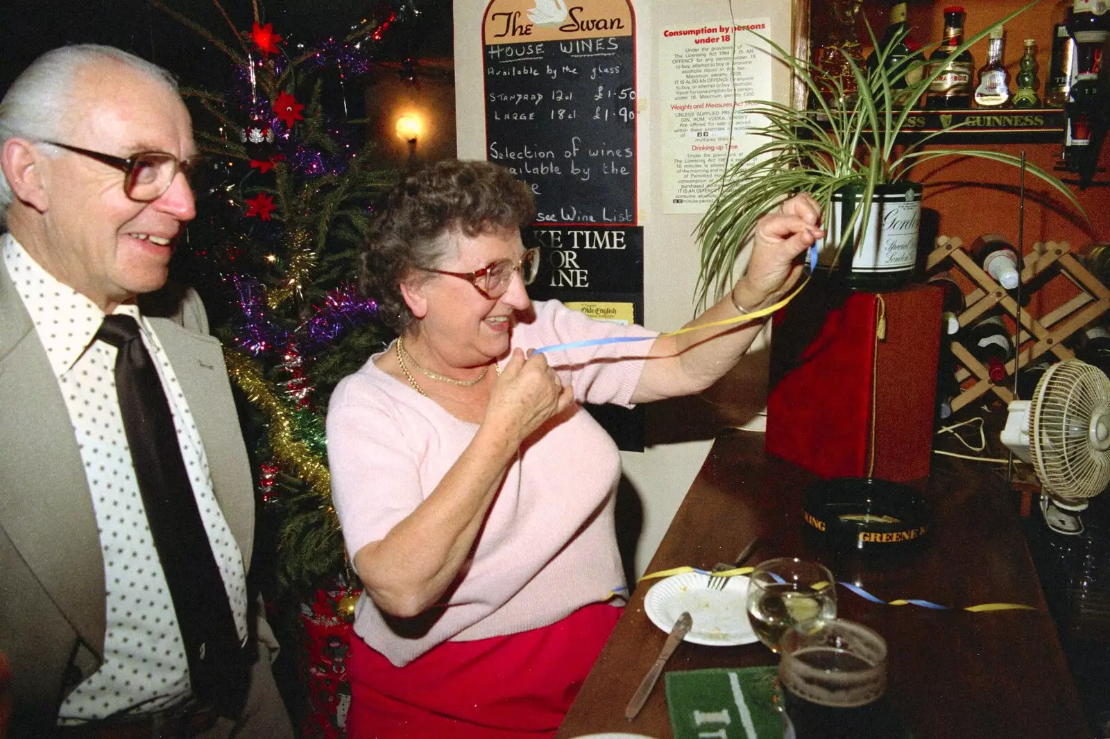 Arline flings some paper tape around, from New Year's Eve at the Swan Inn, Brome, Suffolk - 31st December 1994