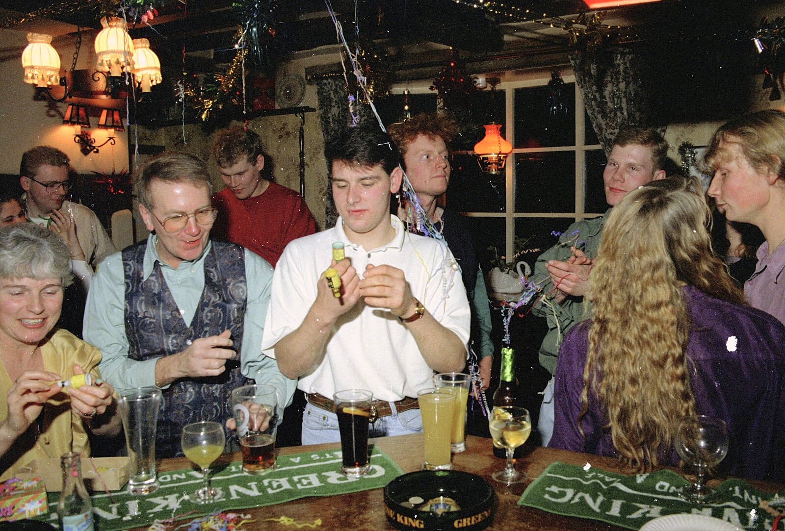 Ricey pulls a popper from New Year's Eve at the Swan Inn, Brome, Suffolk - 31st December 1994