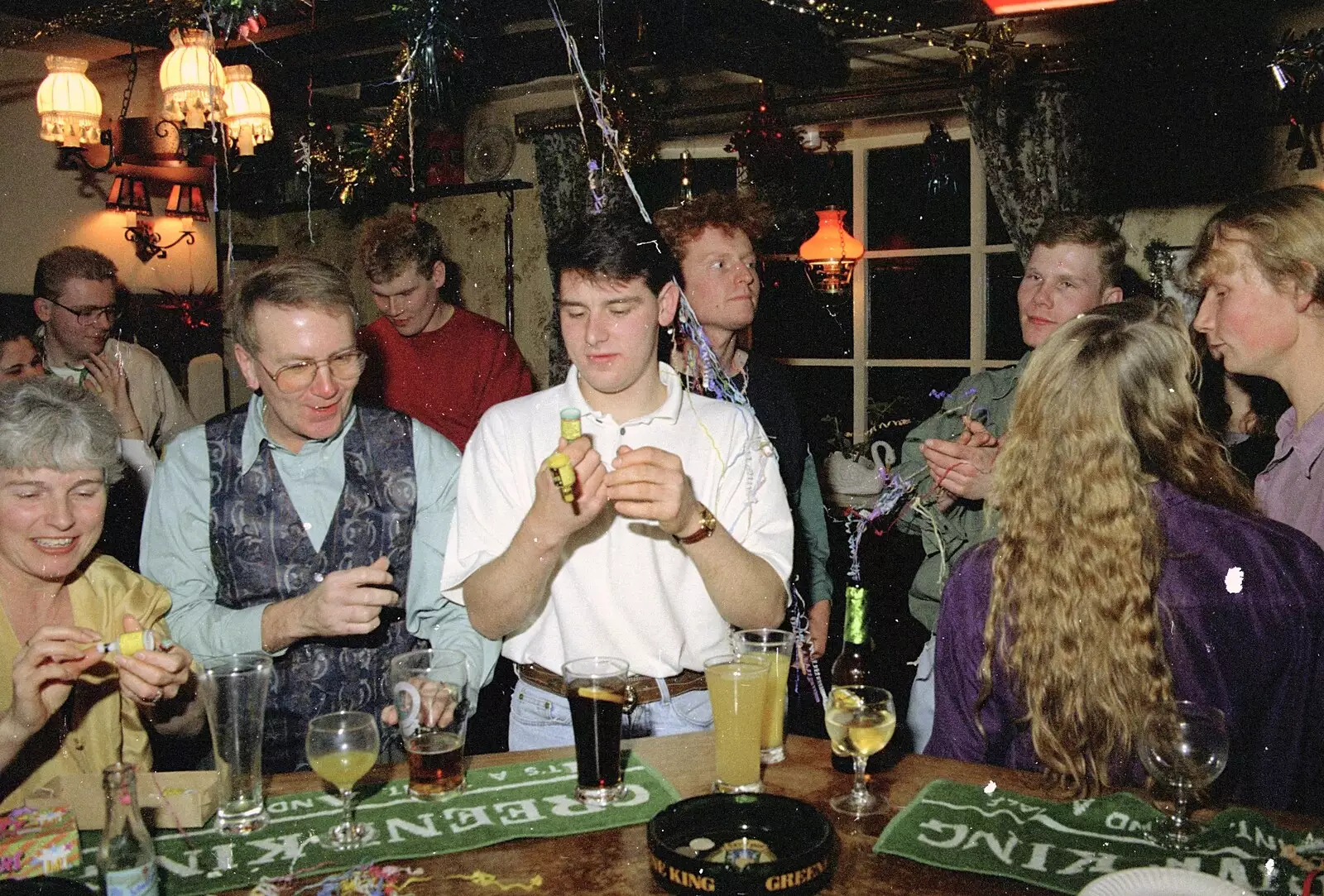 Ricey pulls a popper, from New Year's Eve at the Swan Inn, Brome, Suffolk - 31st December 1994