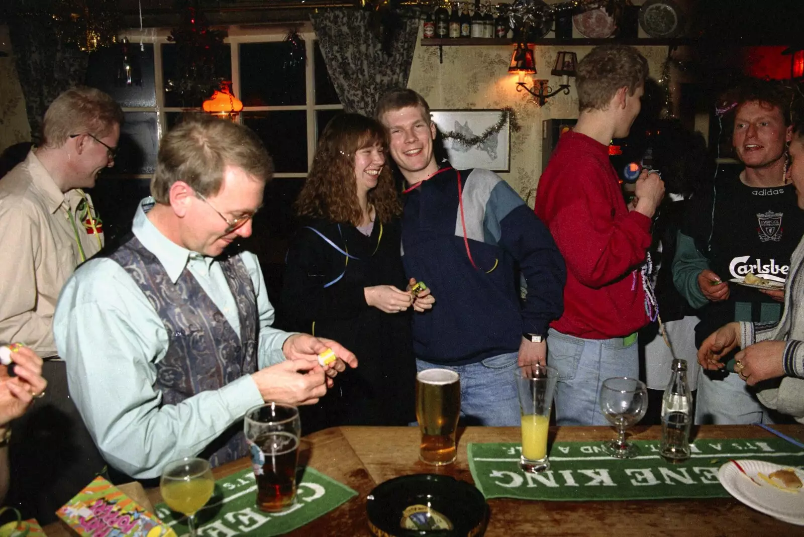 John Willy inspects his party popper, from New Year's Eve at the Swan Inn, Brome, Suffolk - 31st December 1994