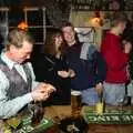 John Willy inspects his party popper, New Year's Eve at the Swan Inn, Brome, Suffolk - 31st December 1994