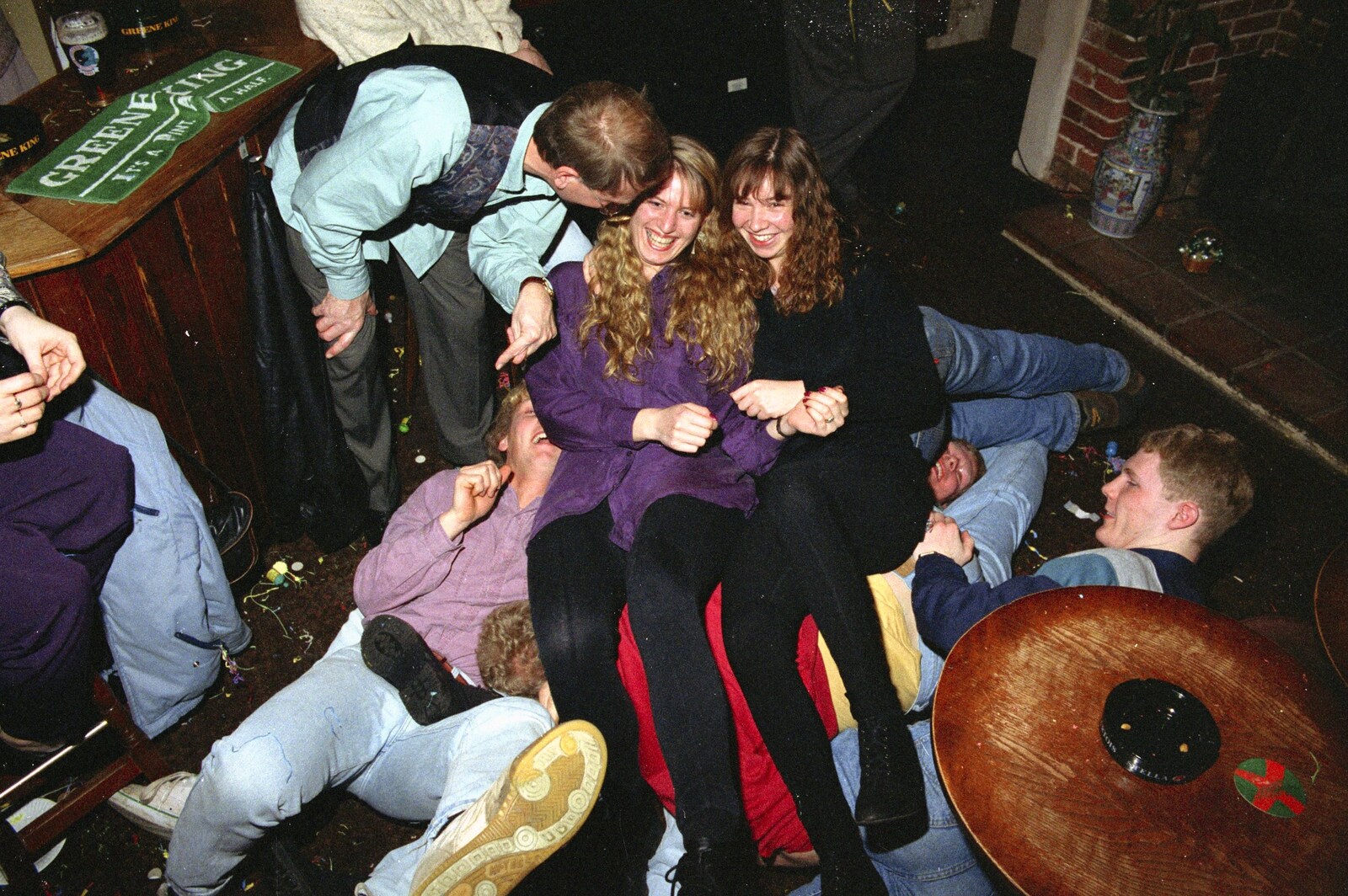 Ally and Jackie sit on top of a pile of lads from New Year's Eve at the Swan Inn, Brome, Suffolk - 31st December 1994