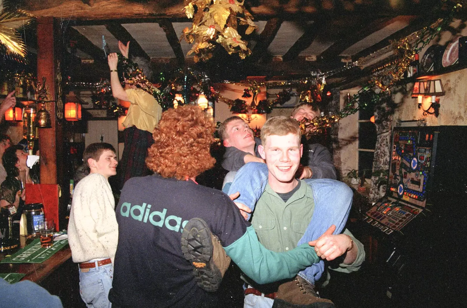 One of the lads is carried around, from New Year's Eve at the Swan Inn, Brome, Suffolk - 31st December 1994