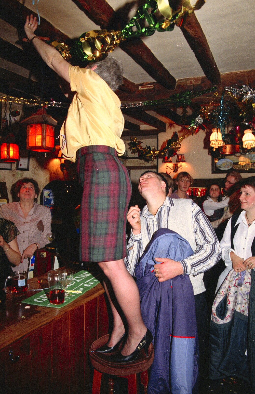 Spammy climbs on a stool from New Year's Eve at the Swan Inn, Brome, Suffolk - 31st December 1994
