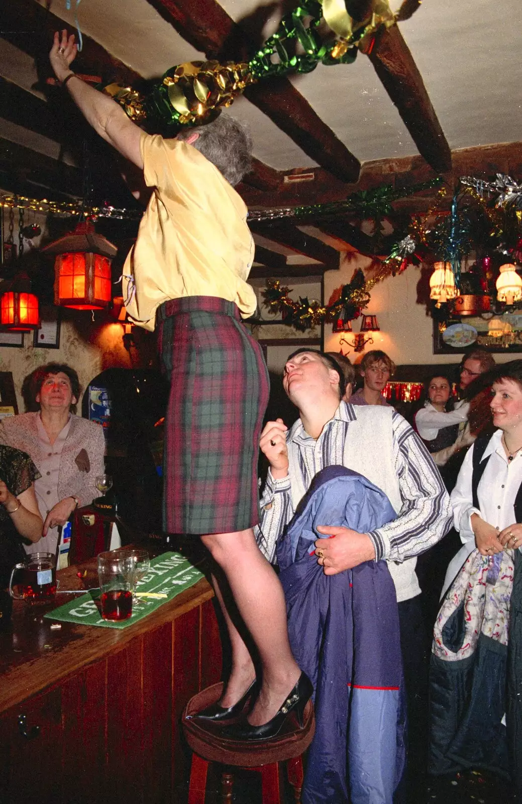 Spammy climbs on a stool, from New Year's Eve at the Swan Inn, Brome, Suffolk - 31st December 1994