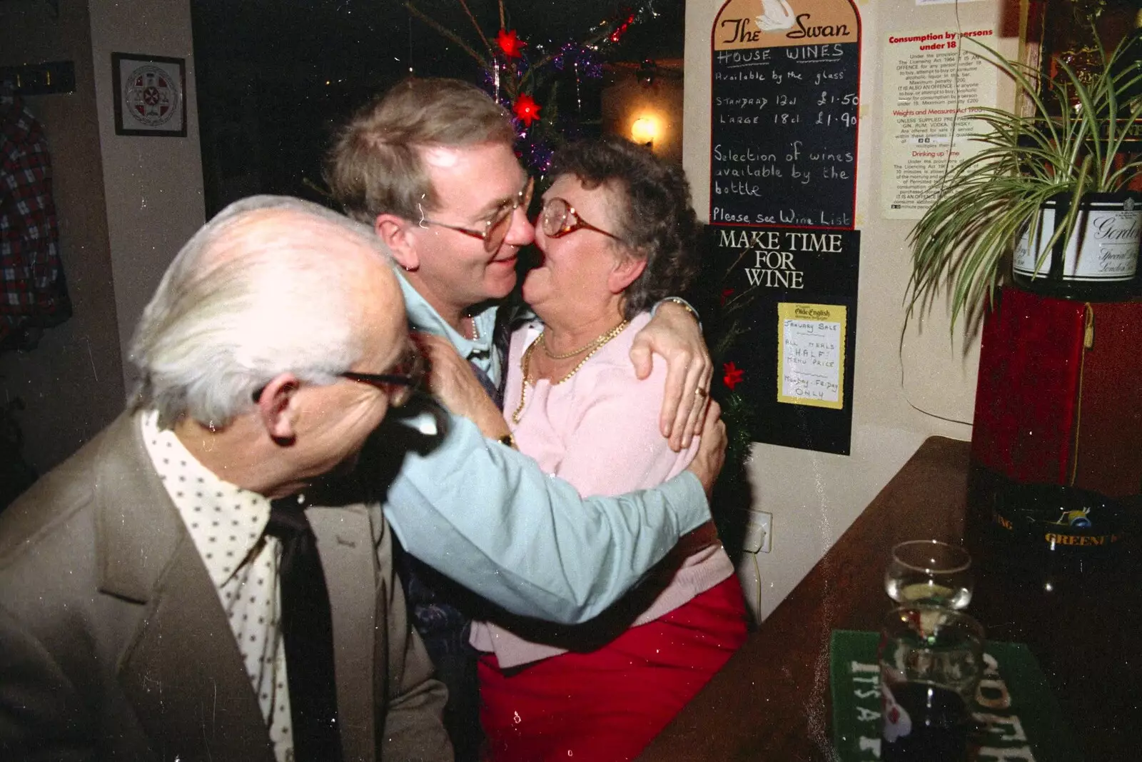 Arline gives John Willy a snog, from New Year's Eve at the Swan Inn, Brome, Suffolk - 31st December 1994