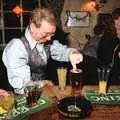 John Willy picks a paper disc out of his beer, New Year's Eve at the Swan Inn, Brome, Suffolk - 31st December 1994