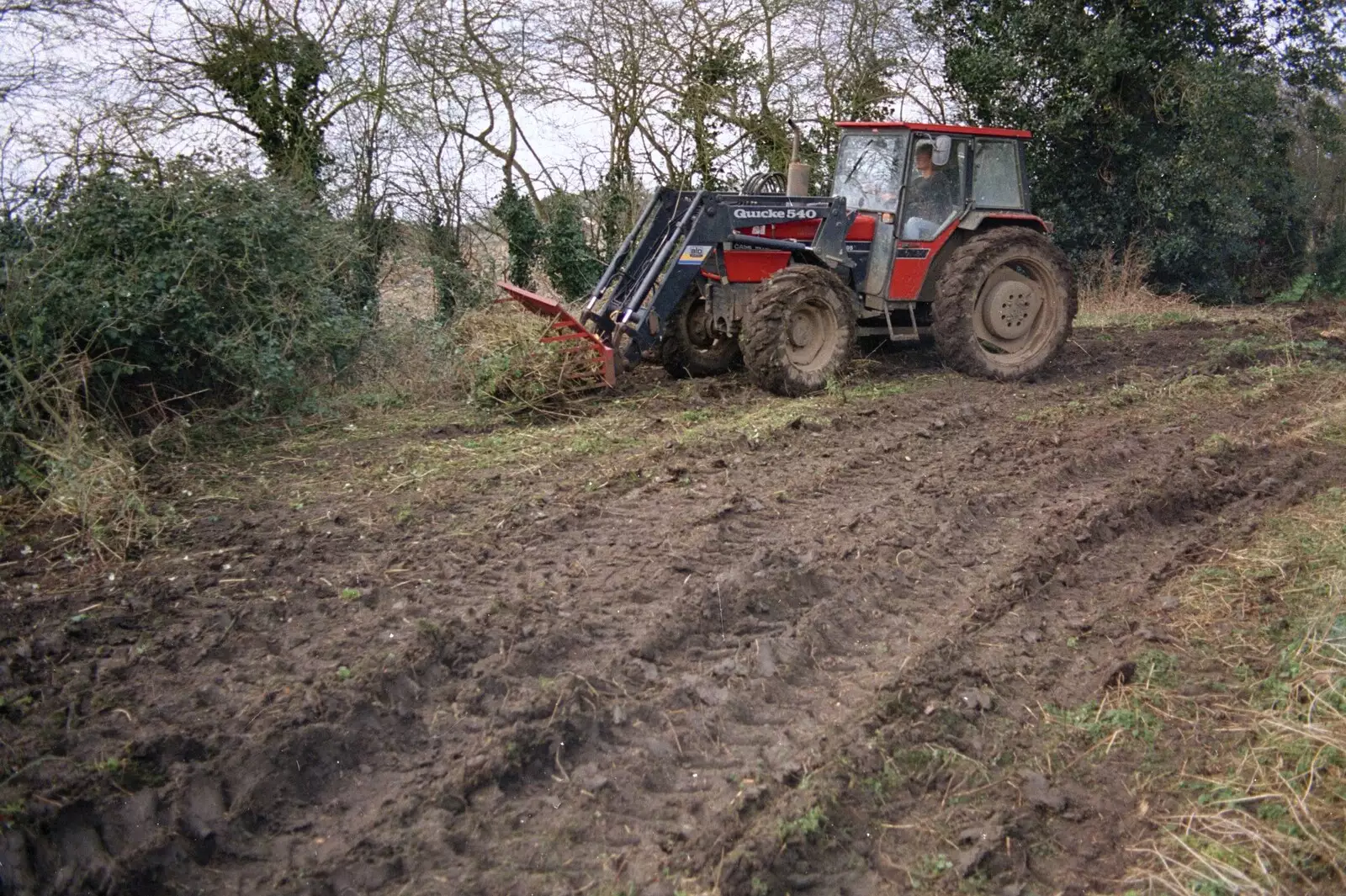 Wavy pushes away a load of brambles, from A Trip to New York, New York, USA - 11th March 1995