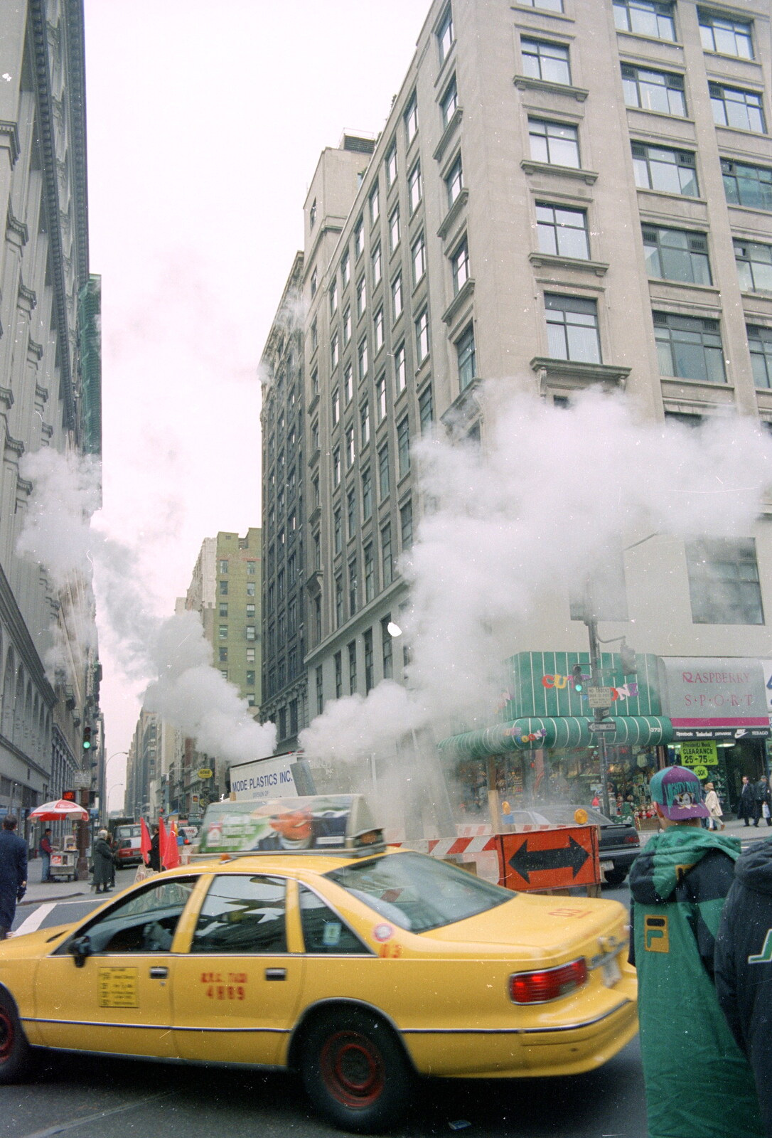 A Trip to New York, New York, USA - 11th March 1995: A yellow cab and New York steam