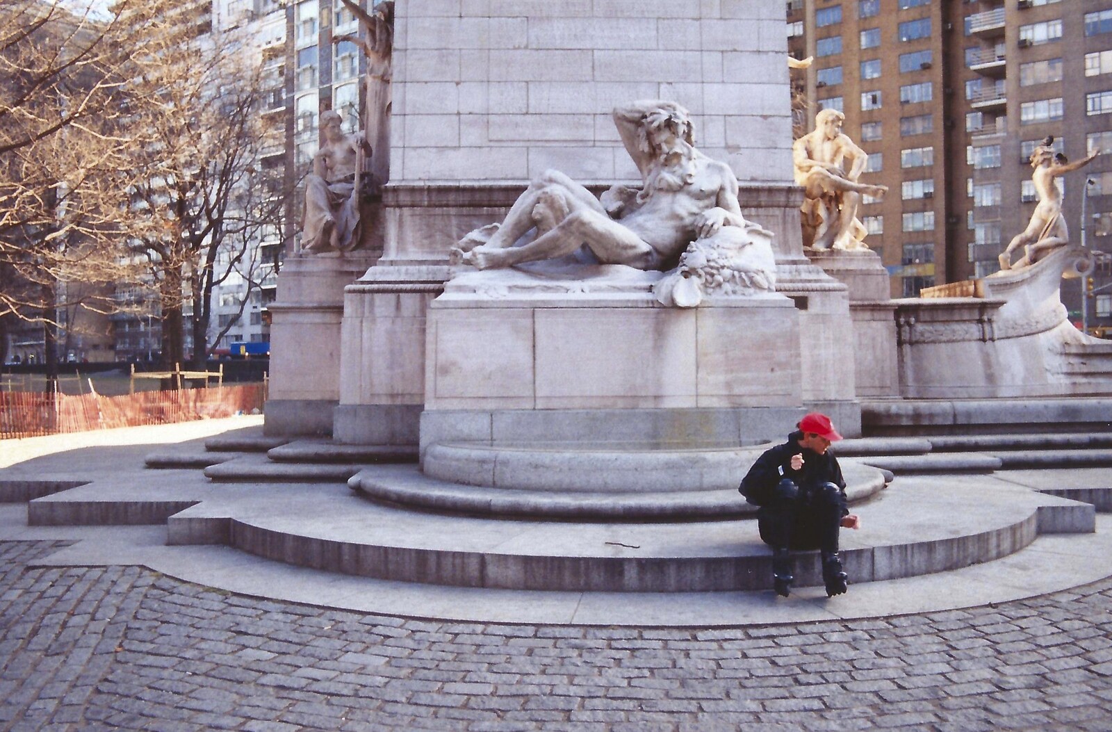 Phil in roller blades by a statue from A Trip to New York, New York, USA - 11th March 1995