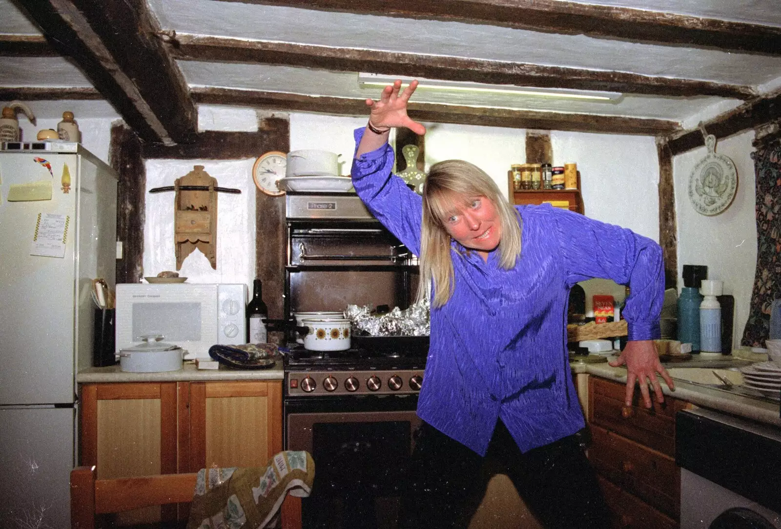 Sue does another crazy move, from Lunch and Dinner at Mad Sue's, Stuston, Suffolk - 30th March 1995