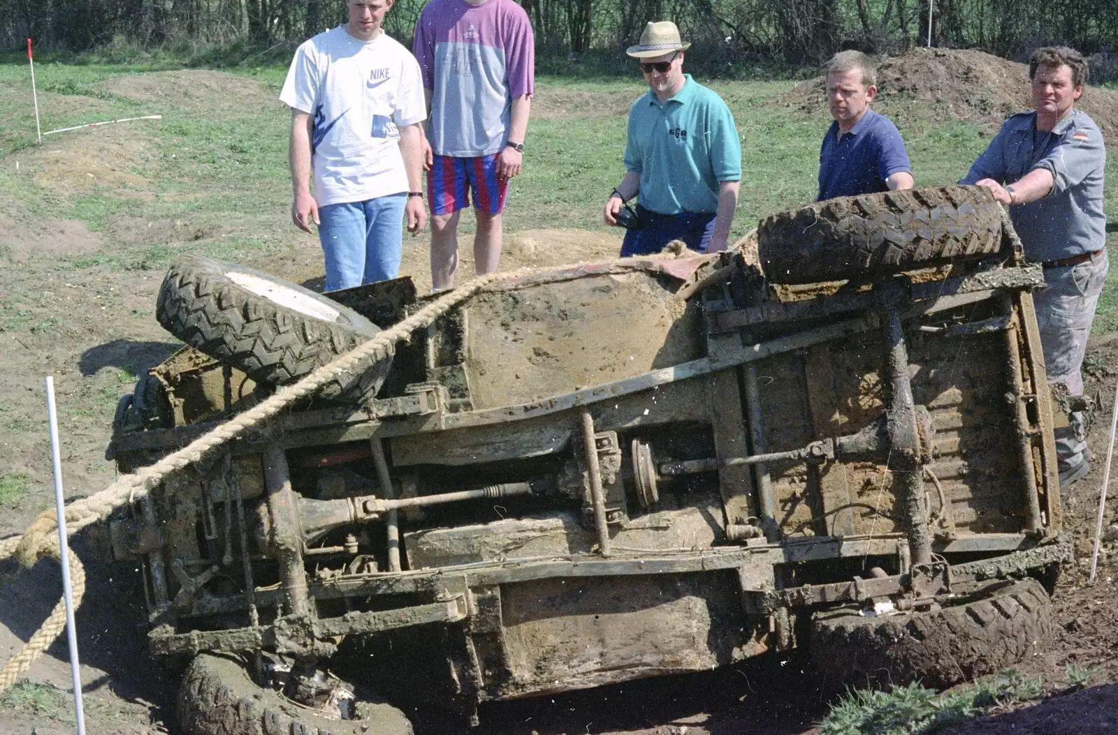 A vehicle has tipped over, as Charlie Bird looks on, from Lunch and Dinner at Mad Sue's, Stuston, Suffolk - 30th March 1995