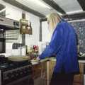 Sue does some hacking with an electric knife, Lunch and Dinner at Mad Sue's, Stuston, Suffolk - 30th March 1995