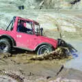 Geoff hits the moddy water, Off-Roading and The Swan Inn, Brome, Suffolk - 20th May 1995