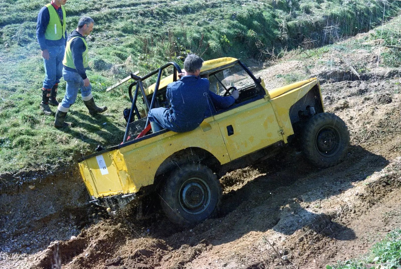 Geoff helps out as ballast, to get a Land Rover up a hill, from Off-Roading and The Swan Inn, Brome, Suffolk - 20th May 1995