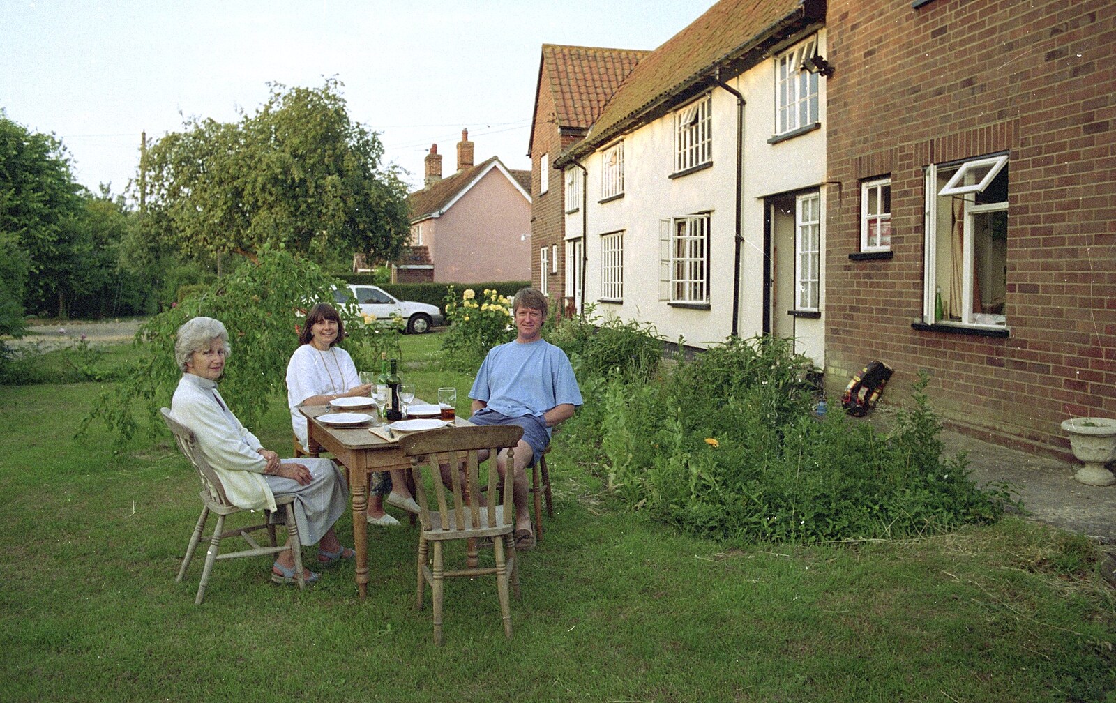 Grandmother, Neil and Caroline Visit, Brome and Orford, Suffolk - 24th July 1995: Outside the house for a spot of 'al fresco' dinner