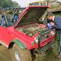 Geoff tops up with coolant, Off-roading with Geoff and Brenda, Stuston and Elsewhere, Suffolk - 15th September 1995