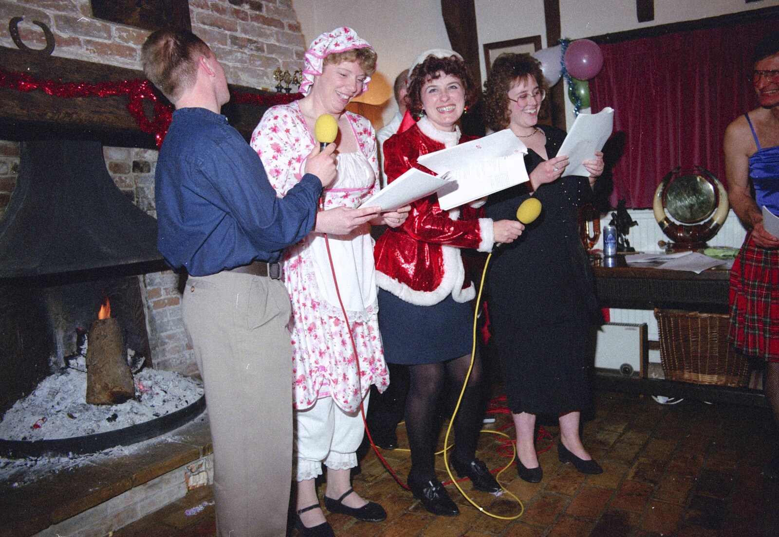 There's much amusement whilst singing from Geoff's Birthday, Stuston, Suffolk - 18th December 1995