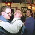 Graham gives John Willy a hug, New Year's Eve in the Swan Inn, Brome, Suffolk - 31st December 1995