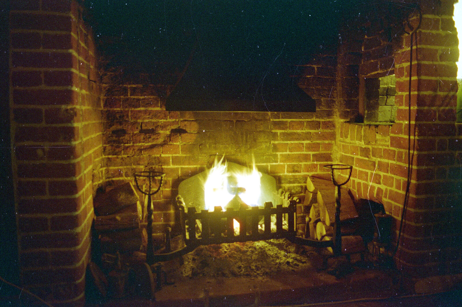 A roaring fireplace from New Year's Eve in the Swan Inn, Brome, Suffolk - 31st December 1995
