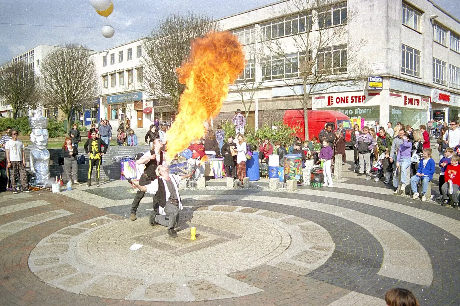 A fire-eater does his thing on Armada Way, from Uni: A CISU Trip To Plymouth, Devon - 16th March 1996