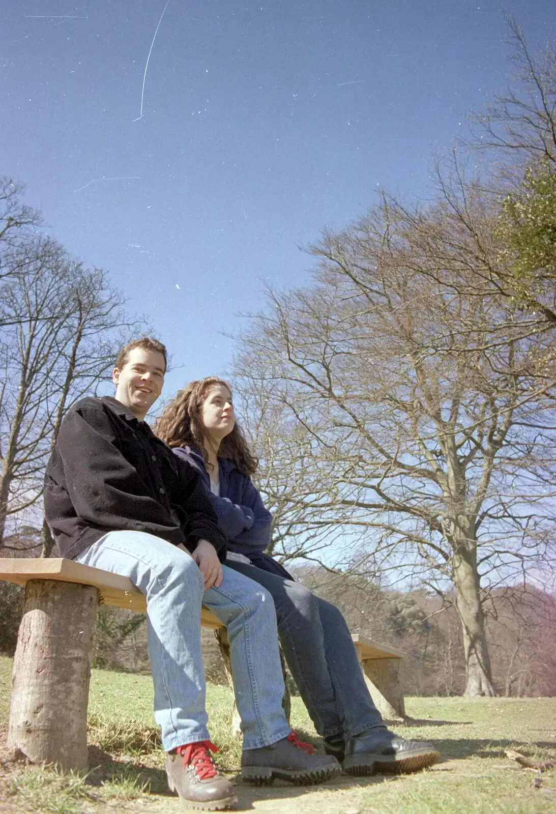 Russell and Vicky sit on a bench, from Uni: A CISU Trip To Plymouth, Devon - 16th March 1996