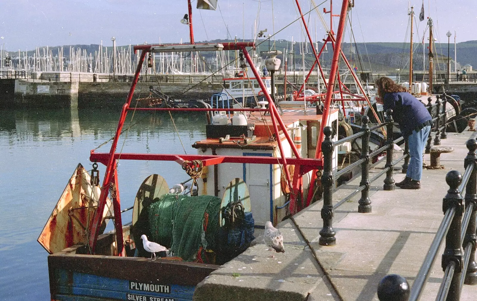 Vicky looks at fishing boats, from Uni: A CISU Trip To Plymouth, Devon - 16th March 1996