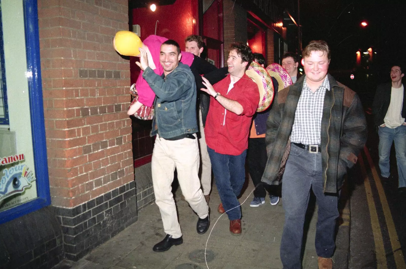 The inflatable doll is paraded past Clowns restaurant, from CISU, Los Mexicanos and the Inflatable Woman, Ipswich, Suffolk - 25th April 1996