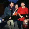 Orhan and Tim carry Trev down the street, CISU, Los Mexicanos and the Inflatable Woman, Ipswich, Suffolk - 25th April 1996