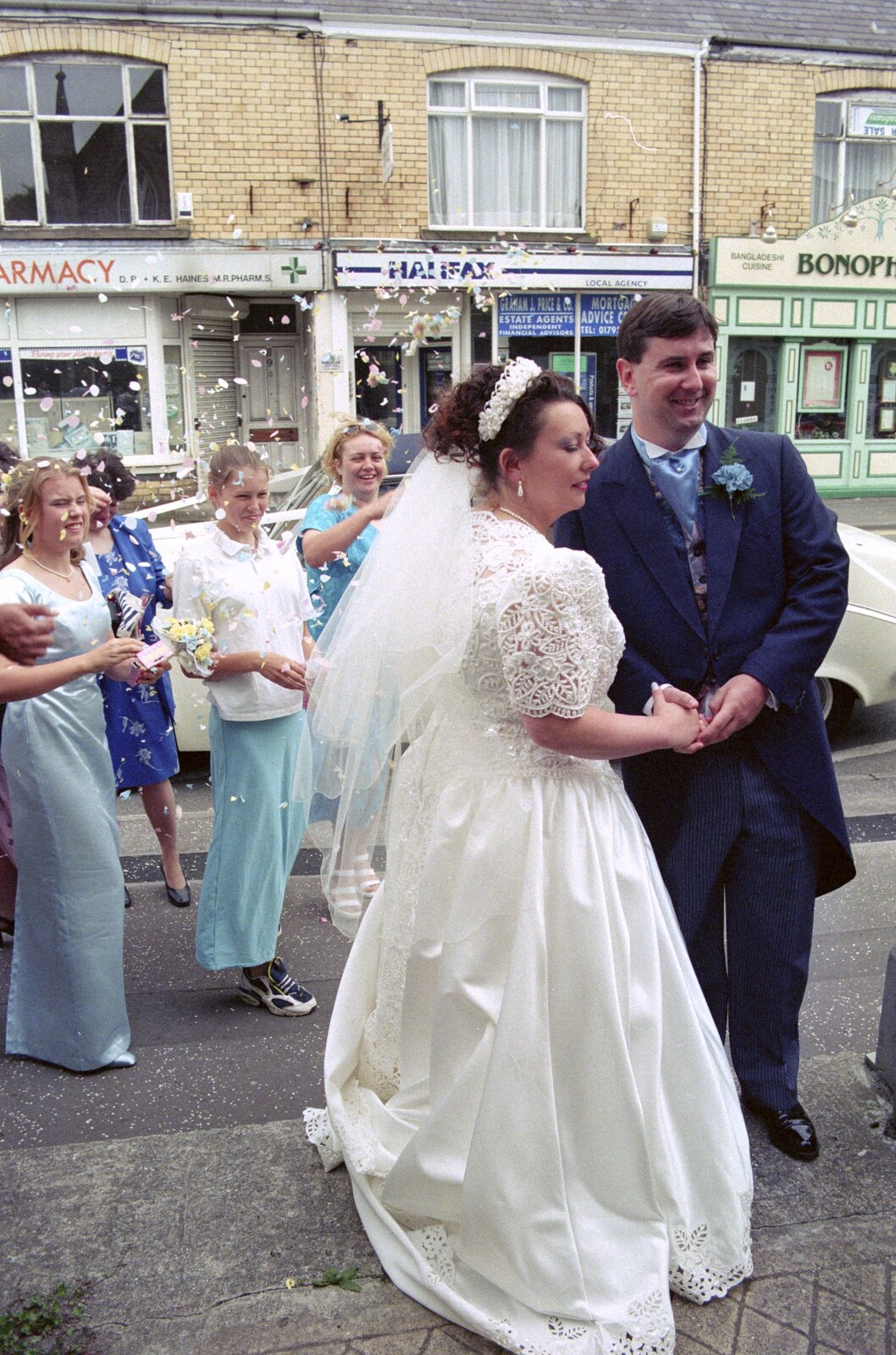 Riki's Wedding, Treboeth, Swansea - 7th May 1996: Confettis is hurled about on the steps of the Treboeth Church
