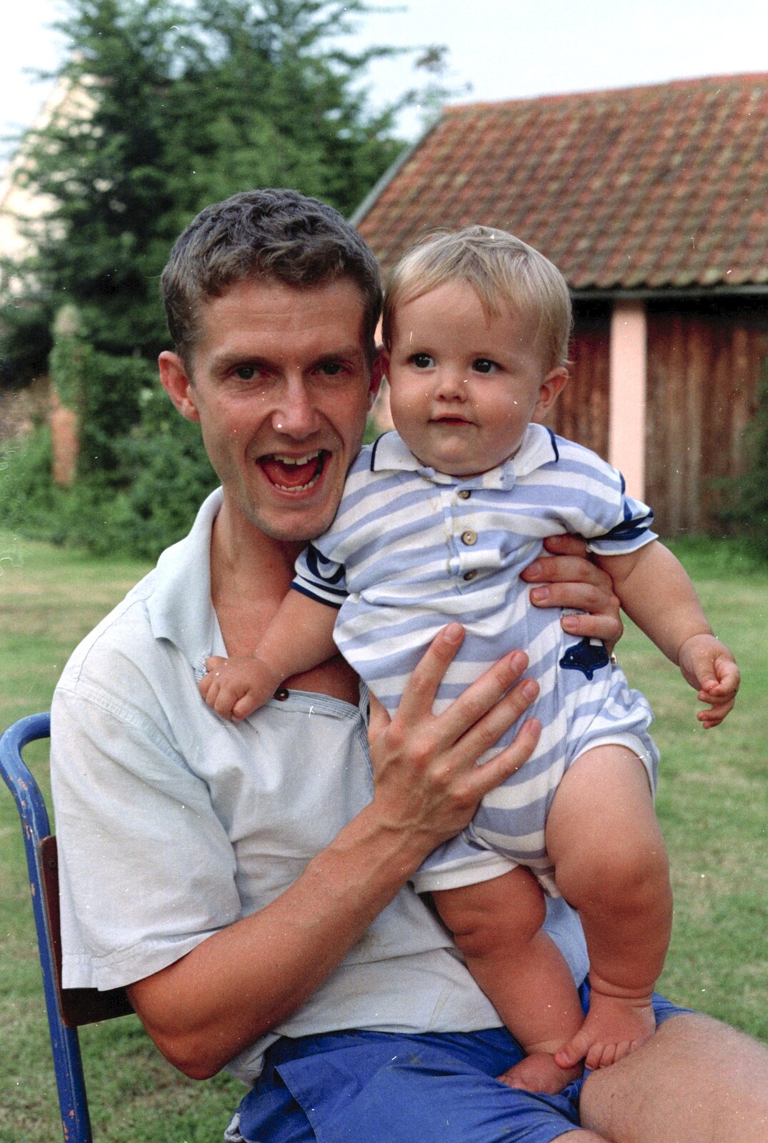 Andy with sprog from Mel and Andy Visit, Stuston, Suffolk - 16th May 1996