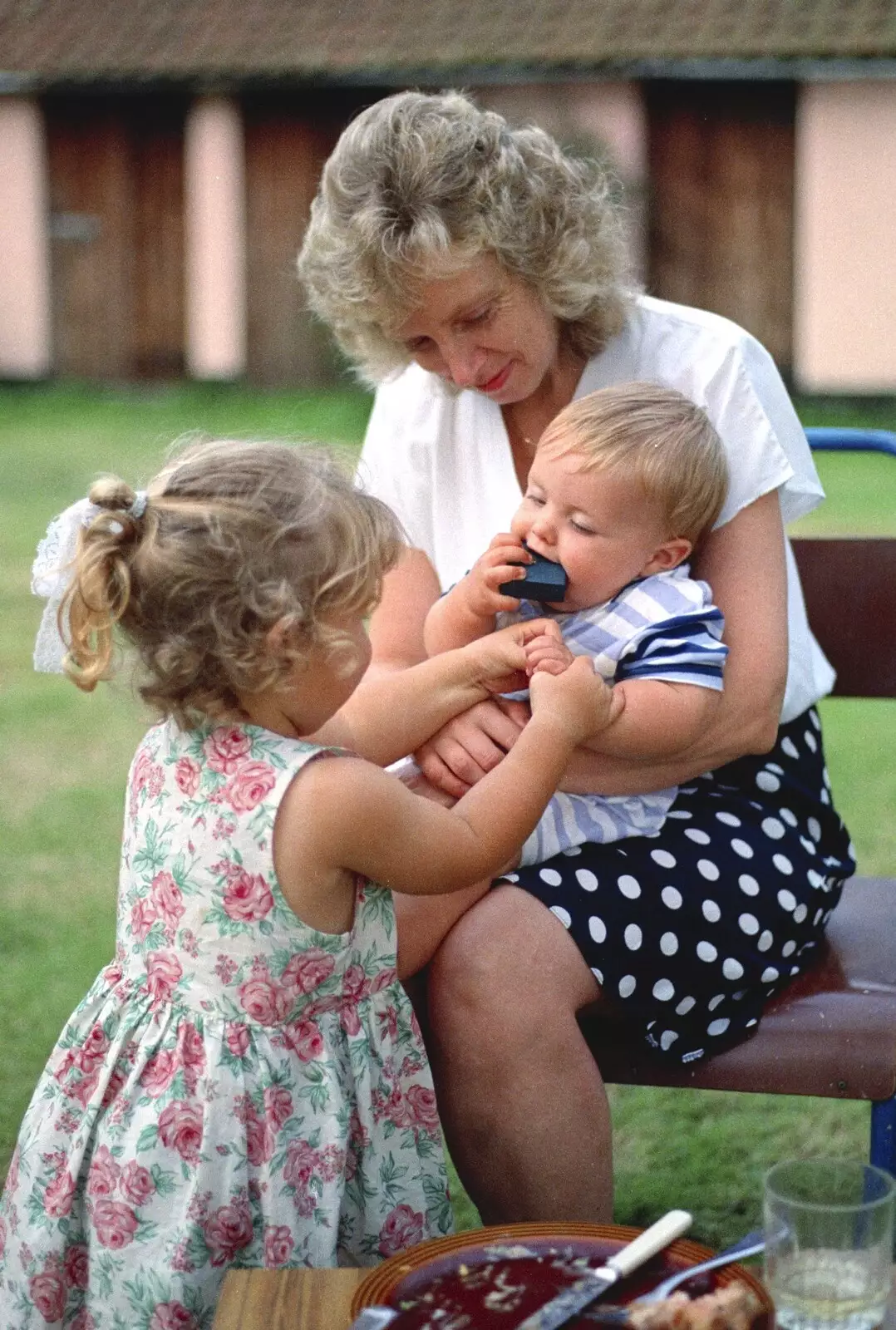 Jean has a go of the sprog, from Mel and Andy Visit, Stuston, Suffolk - 16th May 1996