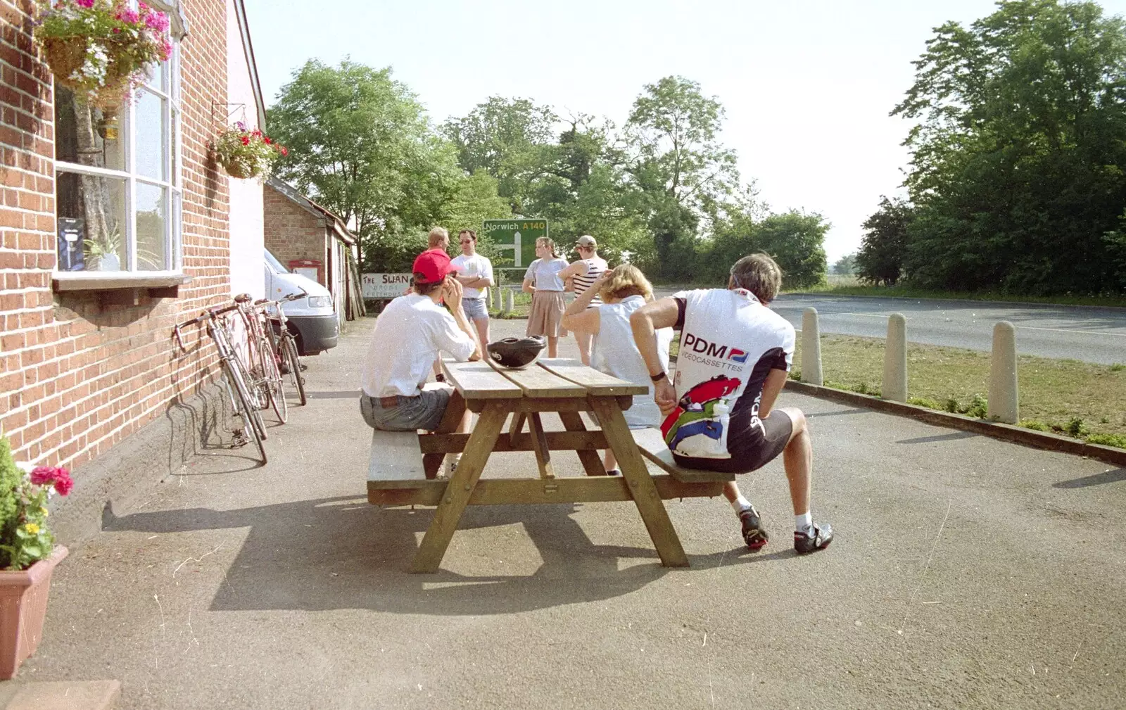 A discussion of tactics outside the Swan, from The First BSCC Bike Ride to Southwold, Suffolk - 10th June 1996