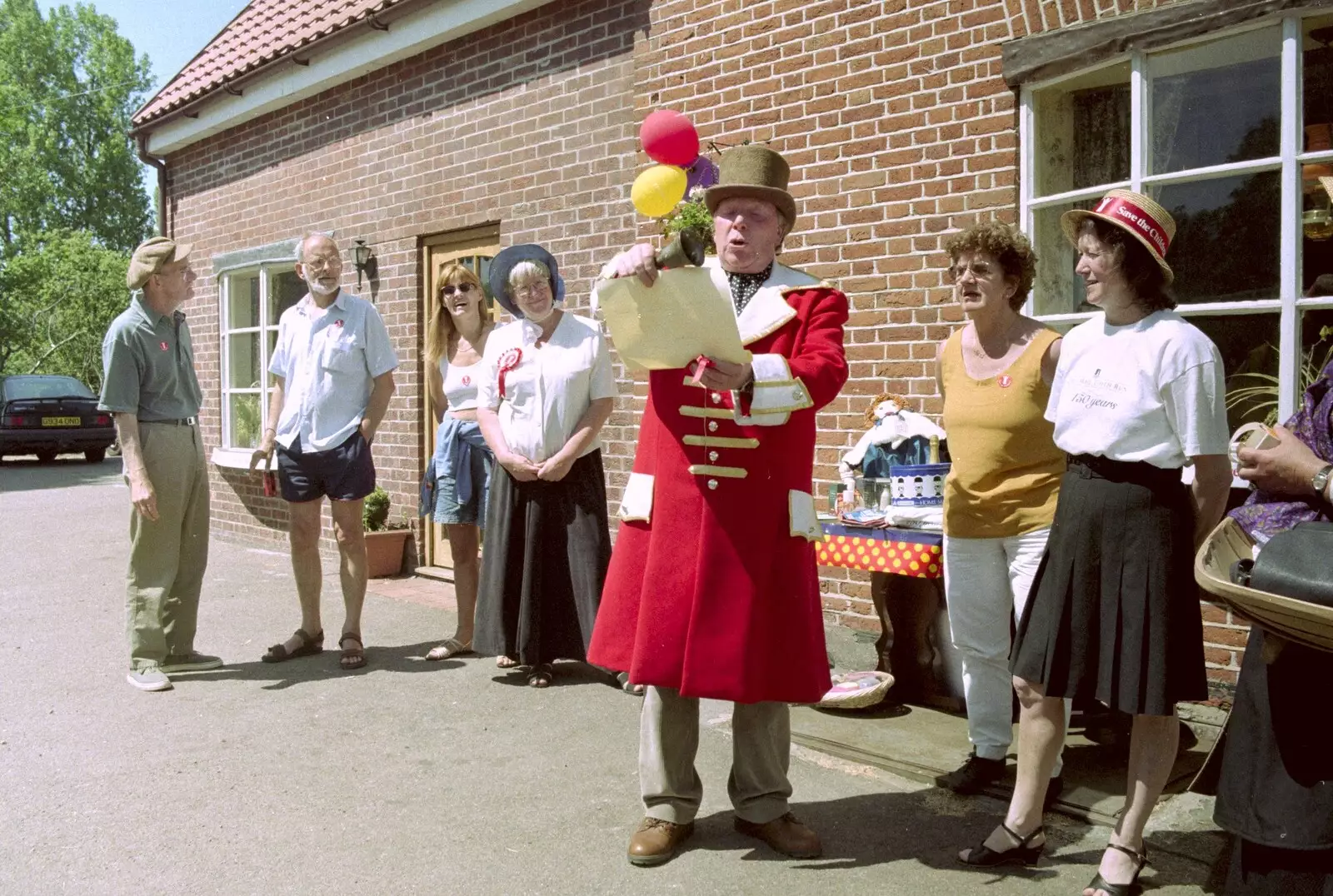 A Town Cryer announces the arrival of the coach, from The Norwich Union Mail Coach Run, The Swan Inn, Brome - 15th June 1996