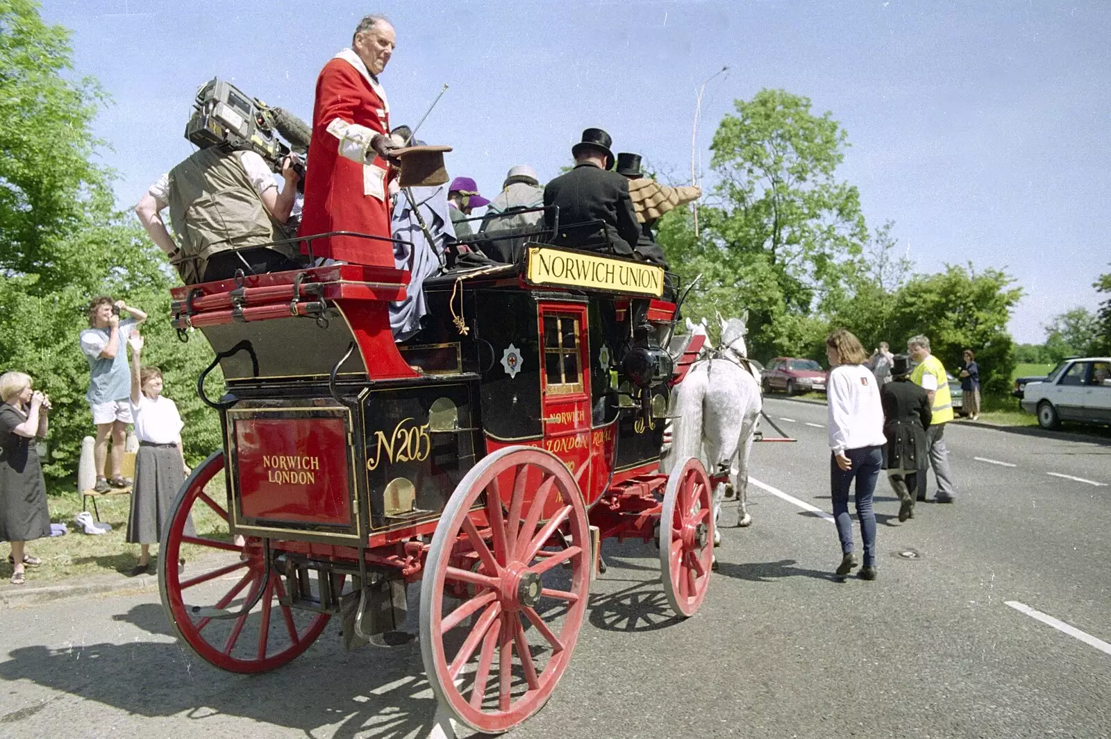 The coach heads off up to Norwich on the A140, from The Norwich Union Mail Coach Run, The Swan Inn, Brome - 15th June 1996