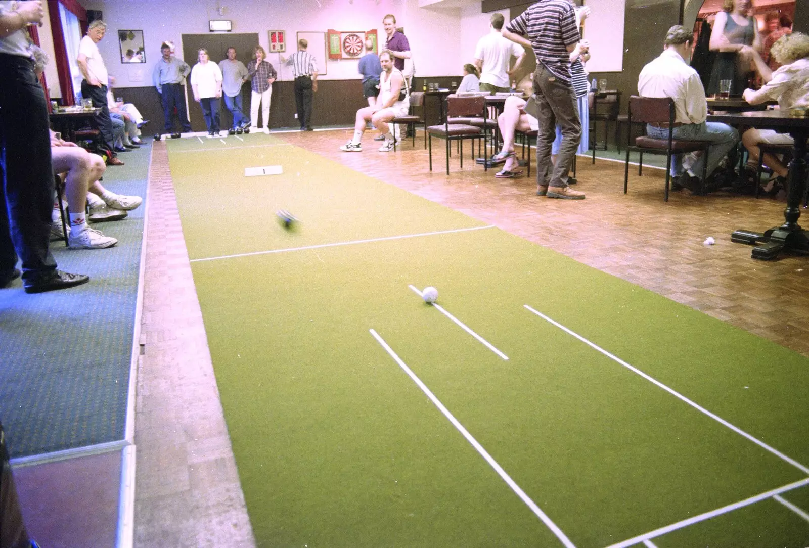 There's some inter-county-council bowling occuring, from A Welly Boot of Beer at the Swan Inn, Brome, Suffolk - 15th June 1996